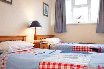 The bright and cheerful twin room is perfect for children or adults.