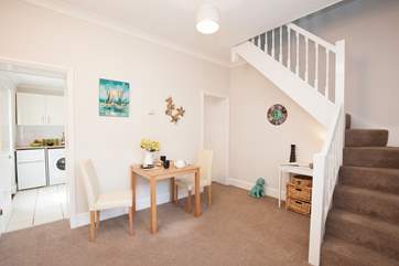 Upstairs is the sitting-room and bedroom