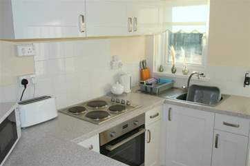 Fully equipped compact kitchen area