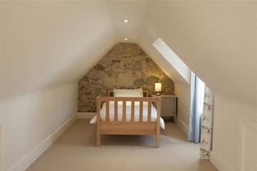 Pretty twin bedroom in the eves