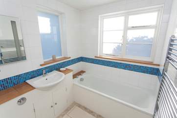 Bathroom with hand held shower & shower cubicle in the main house