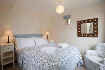 Enjoy a good night's sleep in the master bedroom.
