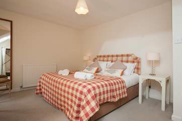 With a super-king bed for ultimate relaxation, this spacious bedroom is a little sanctuary for your peaceful eight hours sleep.