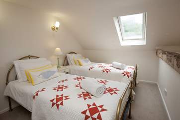 The twin bedrooms offer flexibility for your party.