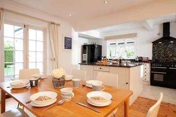 There is ample bright, inviting space for cooking, dining and relaxing.