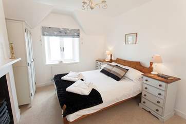 Get a good night's sleep in the lovely double bedroom with views out to sea.