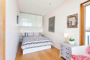 The second bedroom also has a door straight on to the front deck!