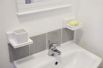 The shower room sink.