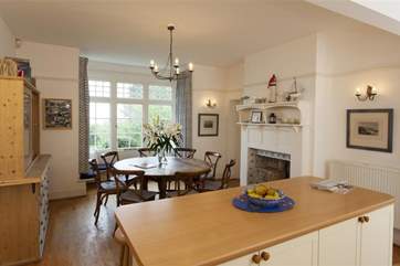 The large kitchen has a circular table with comfortable seating for 8.