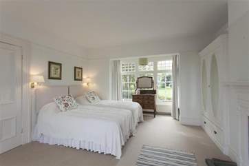 The twin room has built in storage.