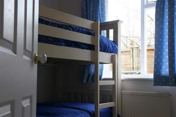 The bunk room is perfect for children.