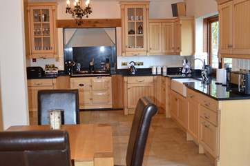 The large kitchen has an additional dining area