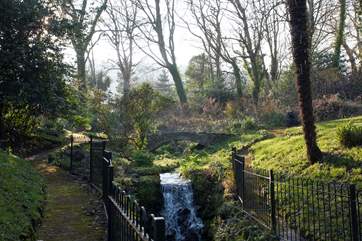Waterfall and stream running through the grounds