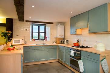 Modern and well-equipped kitchen-area.