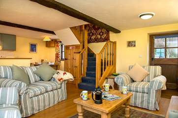 Step straight into the very inviting living area, which also offers immediate access to the first floor.
