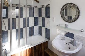 En suite fully fitted with shower over, and a bath, perfect for relaxing in after a full day of exploring this wonderful countryside.