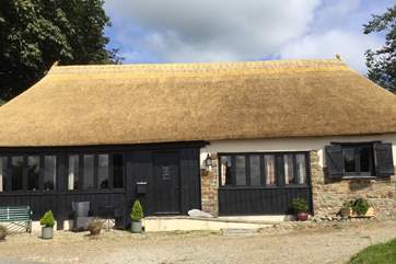 The Old Coach House is simply stunning, especially with its new thatch.