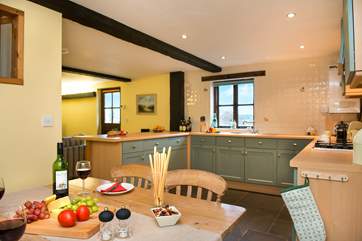 The dining-area is in easy reach of the kitchen.