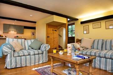 The stairs linking you to the first floor are just off the living area.