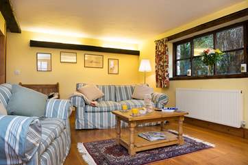 A cosy and comfortable living area, perfect for cosying up and relaxing in.