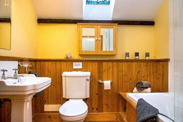 Bathroom, fully equipped with bath and shower over.