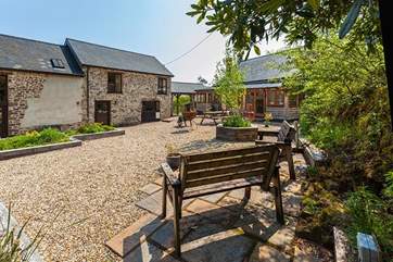 Delightful communal patio area at the rear of Saunton Cottage. This area is also used by the Owners.