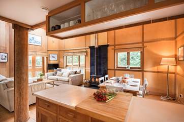 Looking through to the sitting and dining areas from the kitchen.