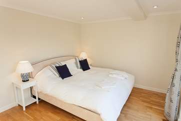 Master suite with doors out to rear balcony and lovely views over the Seaview Nature Reserve.