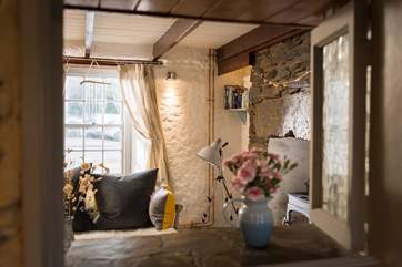 The Owners creative ideas for lighting and furnishings complement the original features of this lovely cottage.