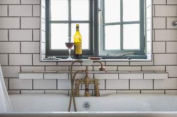 Enjoy a glass of something whilst soaking in the bath after a day out walking.