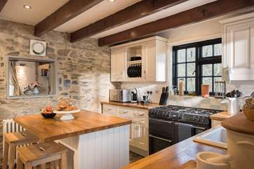 This gorgeous kitchen has a range cooker and plenty of work surface for those who like to cook.