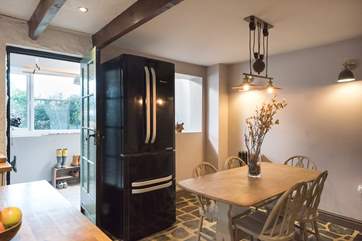 The dining-area with large American-style fridge/freezer.