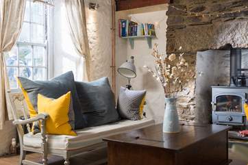 Large squashy cushions to sink into on the stylish sofa chairs.