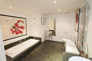 Family bathroom with sunken bath