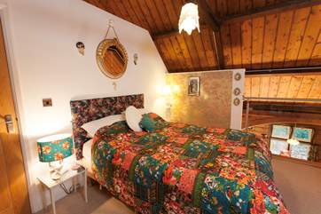 Two of the bedroom are on a mezzanine level designed to take advantage of the large open space of the hall