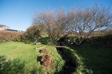 A stream runs through the garden. Please take care with children.