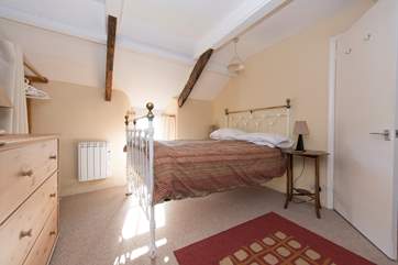 The double bed in the family bedroom.