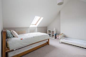 Bedroom 3 has sloping ceilings and a truckle bed with two fully sprung 3ft mattresses.
