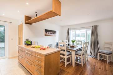 The kitchen/dining-area leads through to the conservatory.