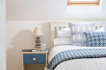 The house is beautifully decorated in pared-back nautical colours.