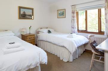 Bedroom 3 has 3 ft twin beds and looks out over the front garden.
