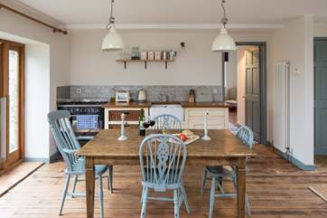 The kitchen-area leads into the ground floor bedroom,