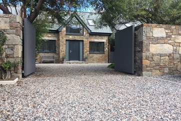 The Willows is a brand new bespoke detached house - an absolute labour of love, with front and rear outside space to enjoy. There is a lawn just inside the gates to the right.