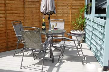 A sunny spot for a drink or dining al fresco on a warm evening.