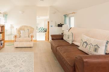 The large leather sofa and comfy armchair await you after a busy day out exploring this beautiful area of Cornwall.