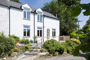 Drovers' Cottage is accessed via a small flight of steps.