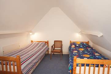 Cosy twin bedroom on the top floor.