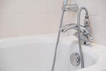 There's a hand shower attachment in the family bathroom.