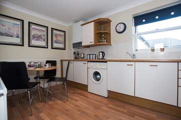 The breaskfast table in the well appointed kitchen.