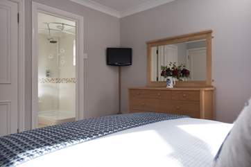 The master bedroom has an ensuite shower room (Bedroom 1).